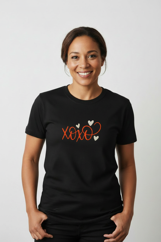 Woman wearing XOXO t-shirt with smaller design
